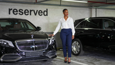 business woman standing beside her luxury automobile generated with Z-Image